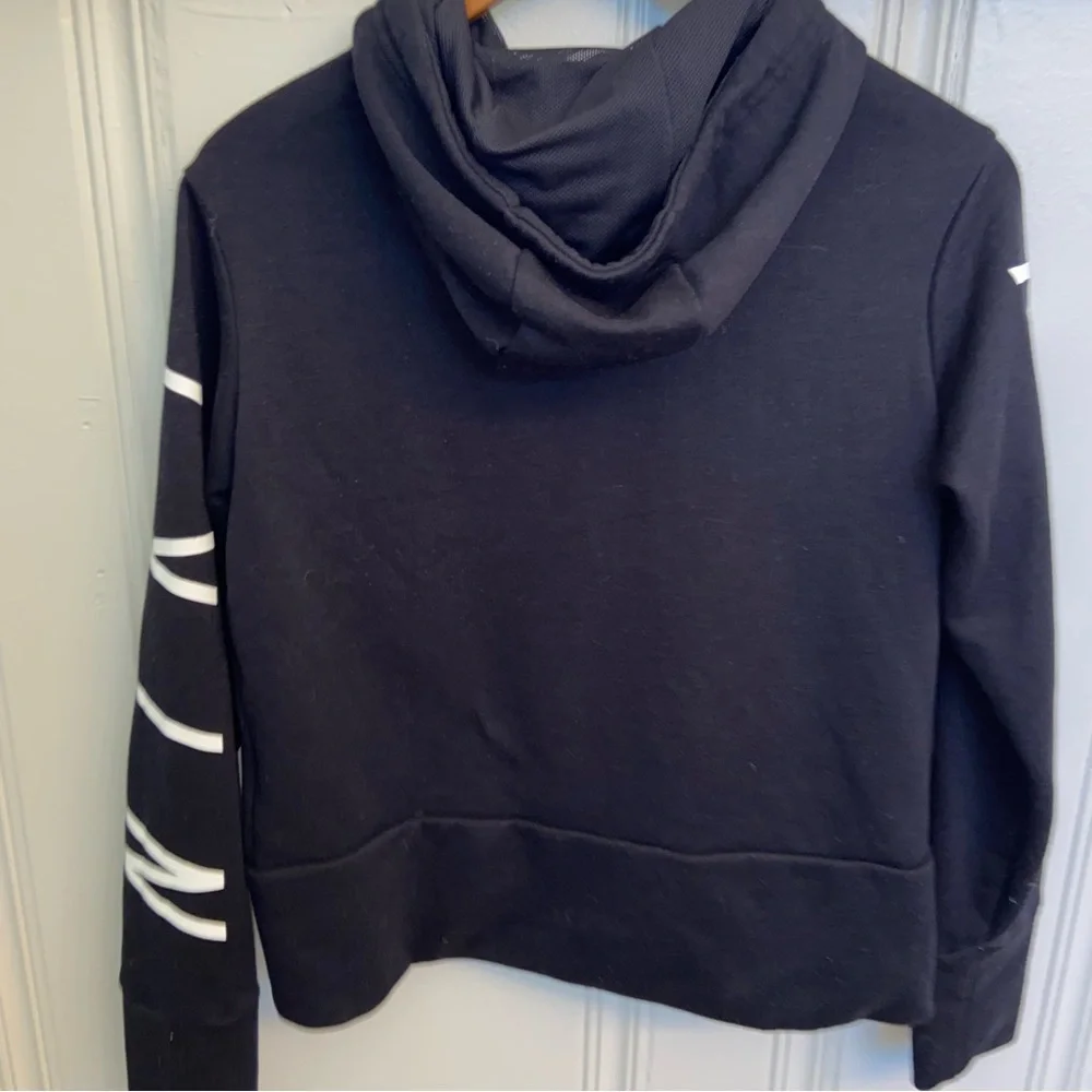 Nike Dri-Fit Hoodie Women’s SmallBlack with  White Spellout Down arm